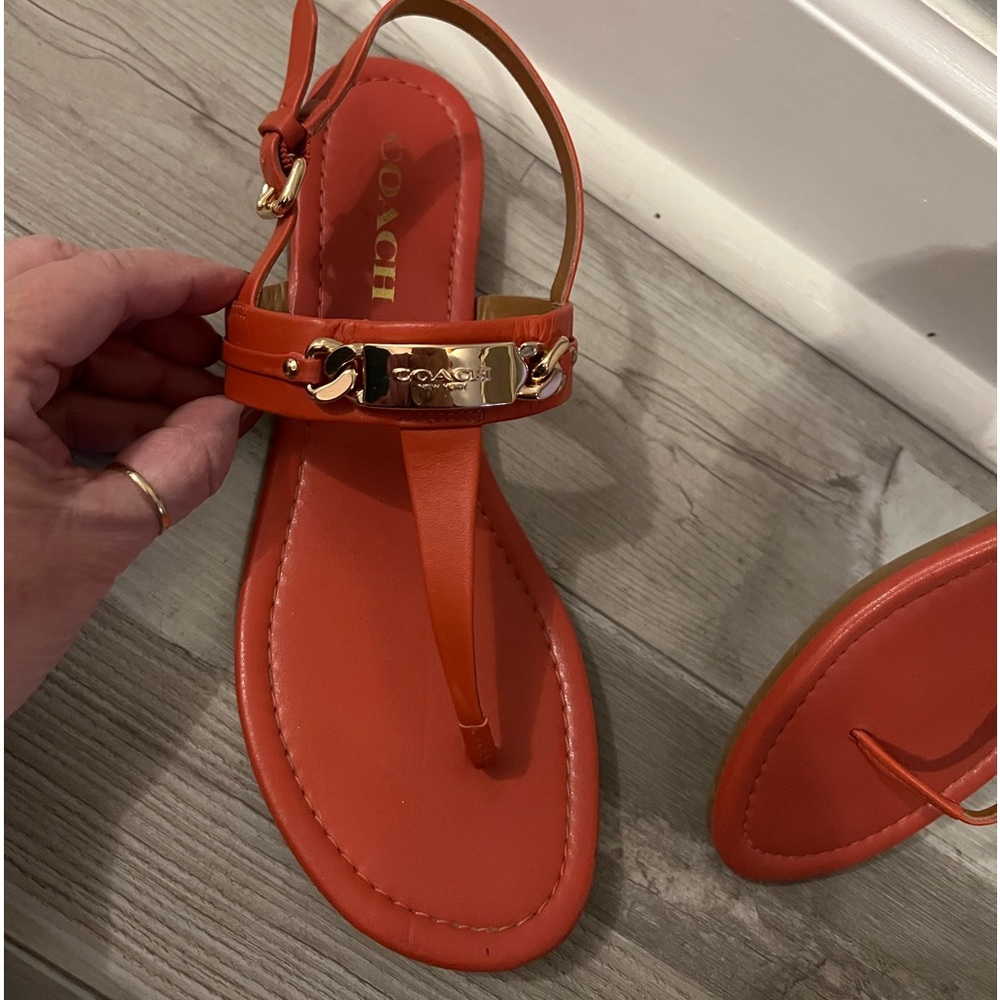 Coach!! Beautiful orange sandals, size 8. Hardly worn, gold logo.